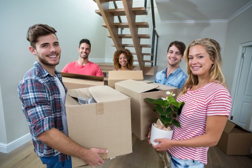Packed boxes and furniture prepared for transport in North End