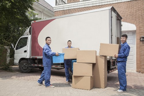Removal team working with boxes during a local move in North End
