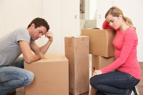 Staff wearing protective gloves and footwear during a house move