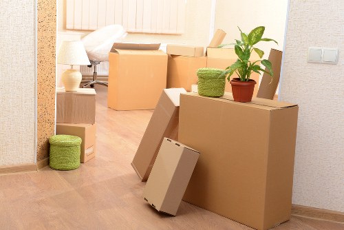 Careful unloading of boxes at a North End property
