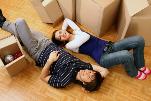 Packed boxes and furniture being loaded during a local move in North End