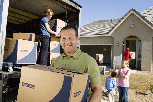 Removal van assisting with a home or business move in North End