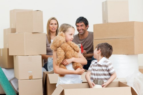 Unpacking and organizing boxes in a North End apartment